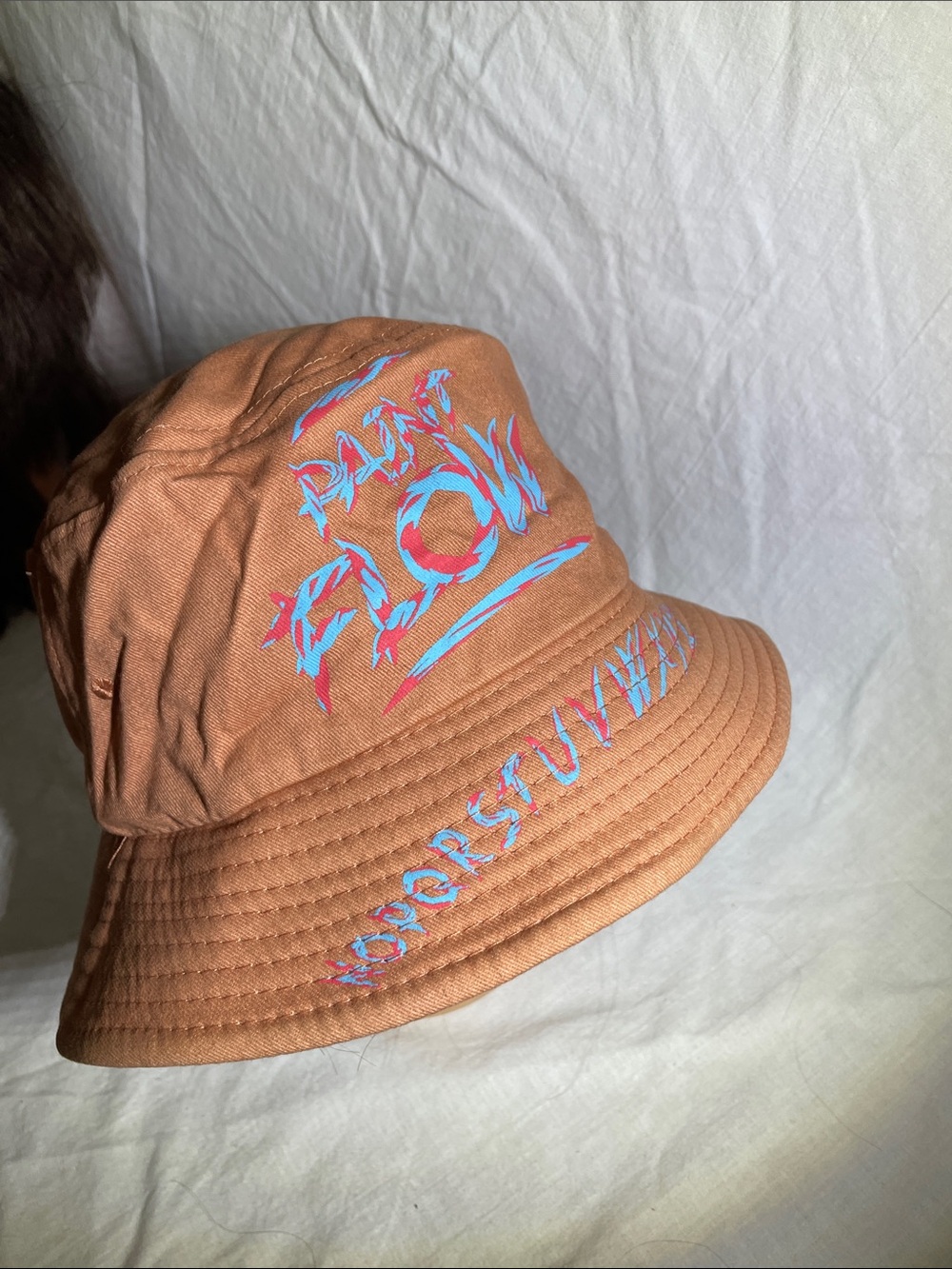 Rust Orange Graphic Bucket Hat with Blue-Pink Lettering